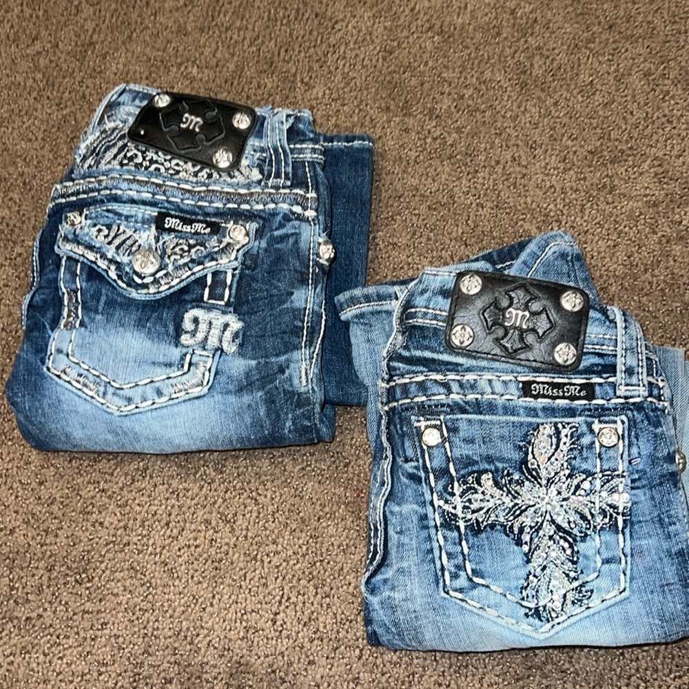 2 pairs miss me skinny jeans. Size 8. Small stains on knees. Not too noticeable.